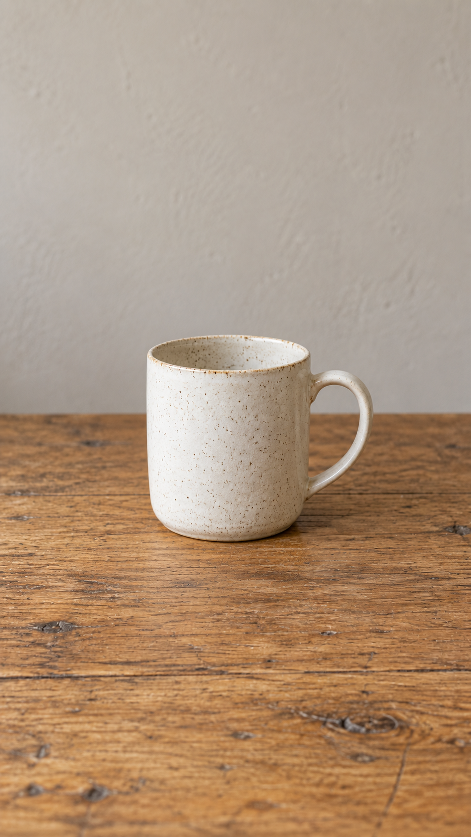 Front light: illustrative ivory mug on an oak table